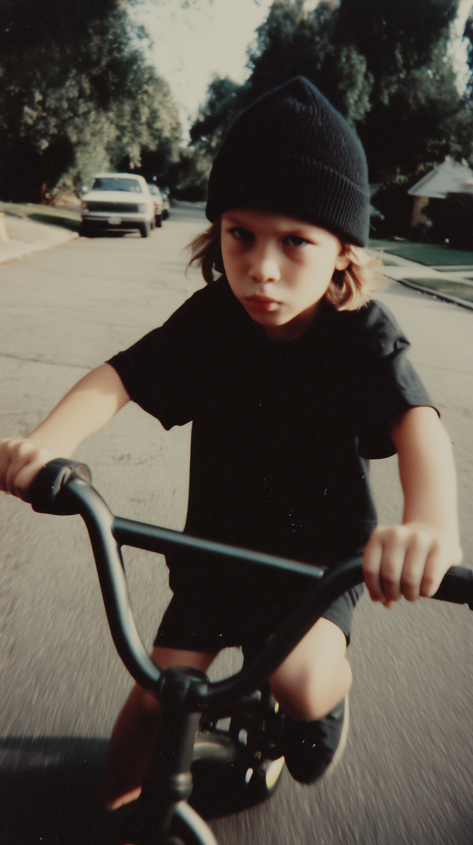 90s Childhood Vibes: Rebel Boy on Big Wheel