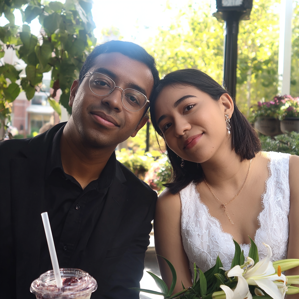 Couple in Christian Wedding Attire with Lily Bouquet