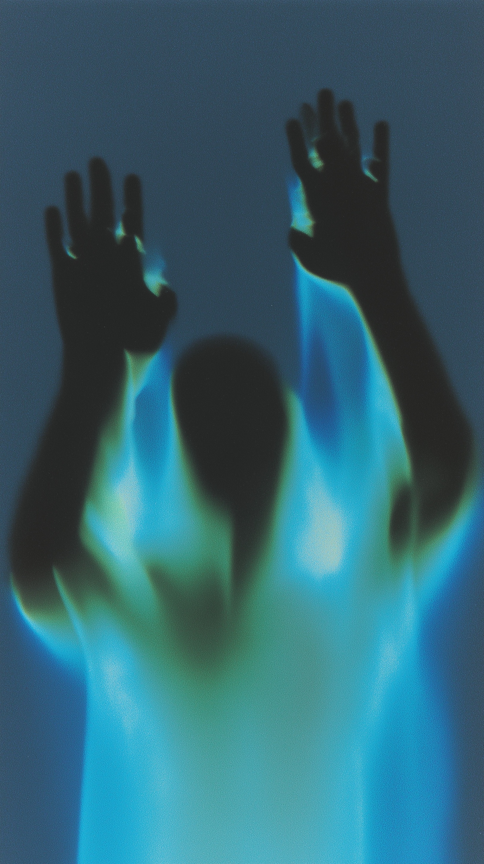 Mysterious Silhouette Pushing Against Transparent Surface