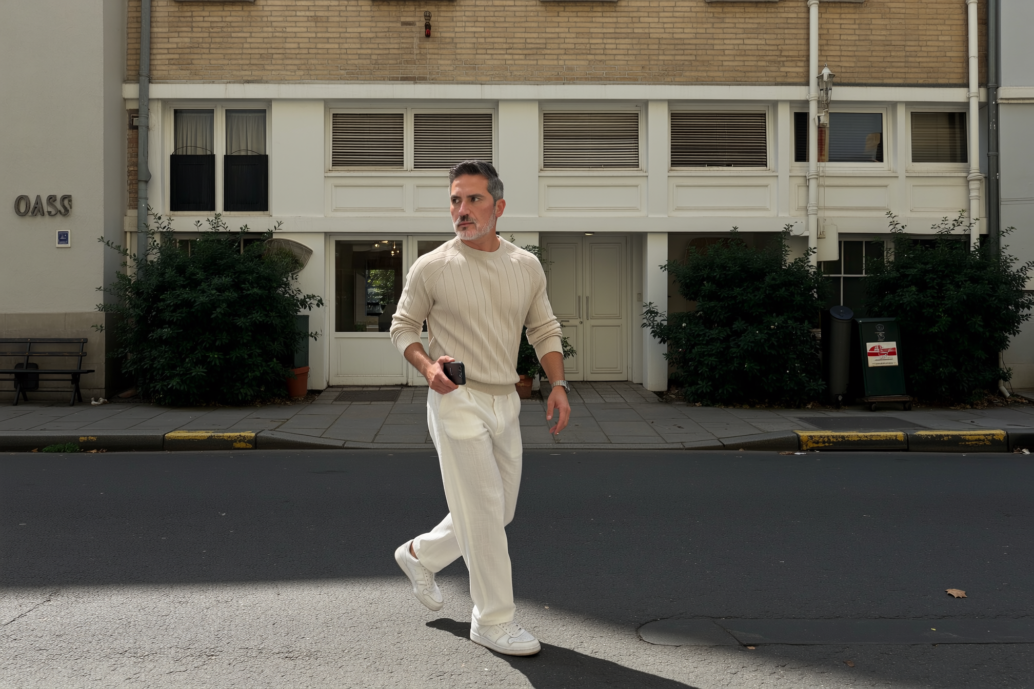 Tranquil City Stroll: Focused Man in Neutral Tones